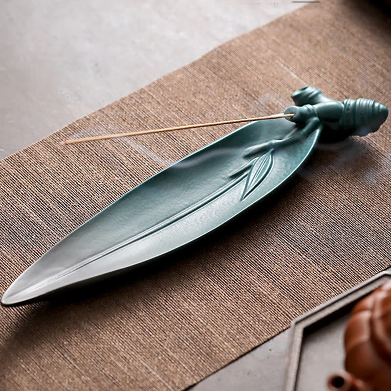 Ceramic Nature Incense Burner – Bamboo leaf design top view on tea mat, serene oriental decor