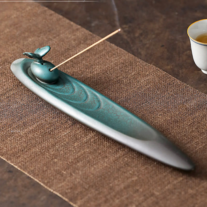 Ceramic Nature Incense Burner – Butterfly design top angle with tea cup, peaceful tea ritual