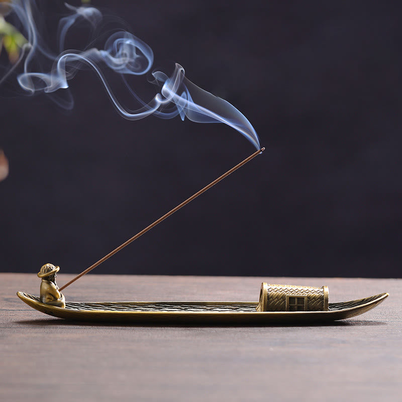 Fisherman Boat Alloy Incense Burner – side view with fragrant smoke rising, zen meditation decor