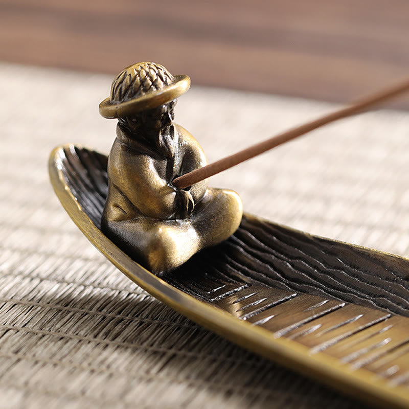 Fisherman Boat Alloy Incense Burner – close-up of fisherman figure detail, handcrafted bronze art