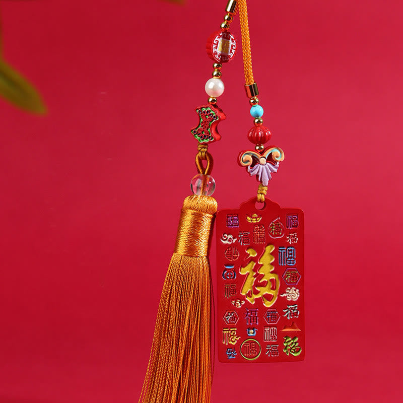 Natural Cinnabar Bagua Yin Yang Fu Hanging - hundred blessings variant with greenery accent showing gold tassel, lucky orn...