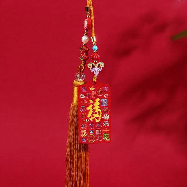 Natural Cinnabar Bagua Yin Yang Fu Hanging - frontal view of hundred blessings variant with golden tassel, Chinese lucky c...