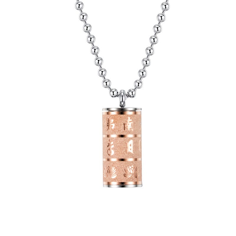 Prayer Wheel Lotus Necklace – rose gold cylinder pendant on white, silver ball chain, Warm