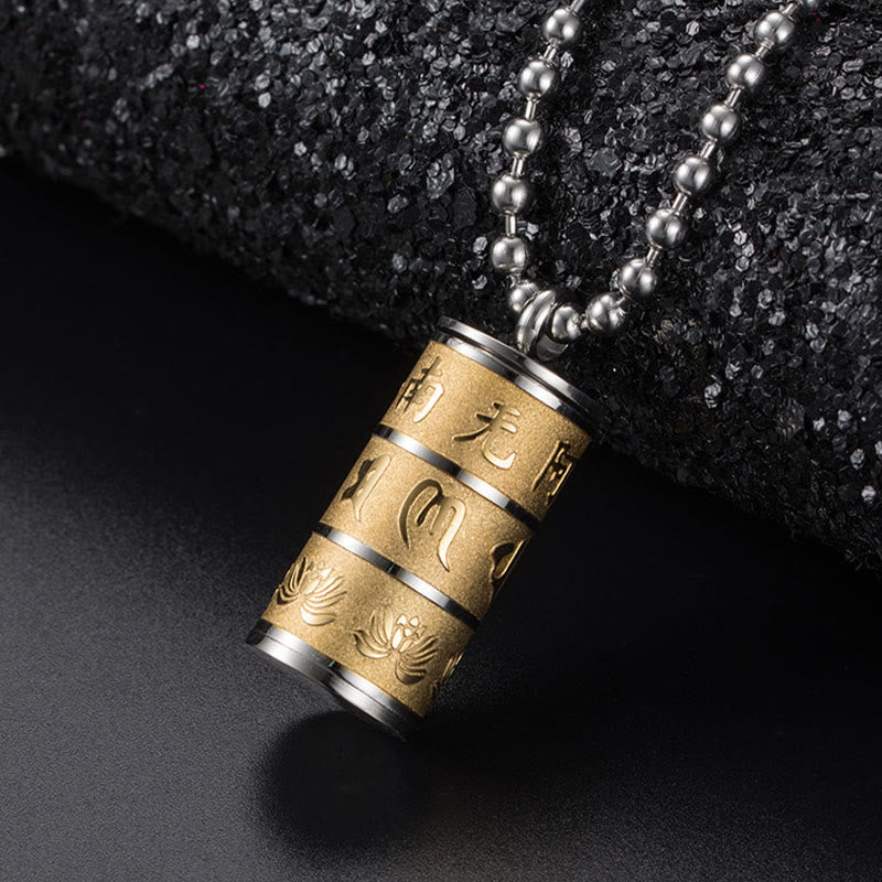 Prayer Wheel Lotus Necklace – gold-silver pendant on black rock, engraved Buddhist mantra, Spiritual
