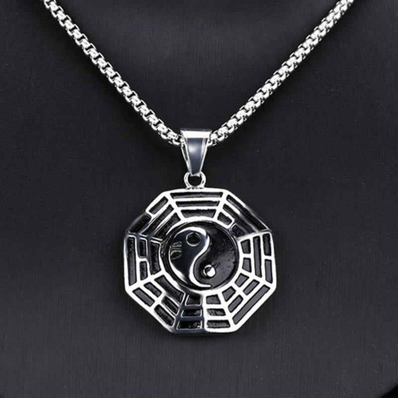 Titanium Steel Bagua Yin Yang Necklace - Silver Bagua pendant frontal view on dark background, spiritual amulet