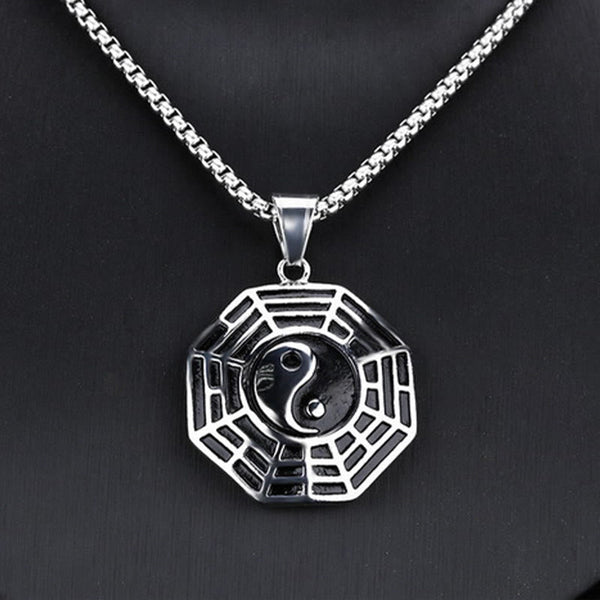 Titanium Steel Bagua Yin Yang Necklace - Silver Bagua pendant frontal view on dark background, spiritual amulet
