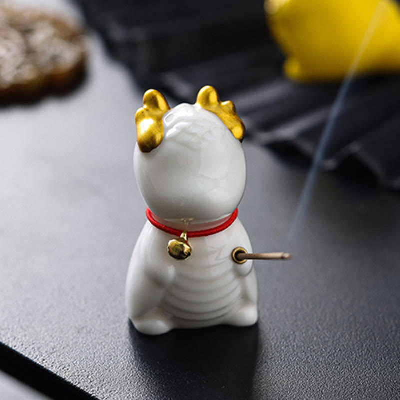 Ceramic Dragon Bell Incense Burner – white cat lucky cat variant with incense in paws, bokeh foliage, Whimsical
