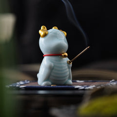 Ceramic Dragon Bell Incense Burner – celadon dragon with gold horns and red bell collar, smoke rising, Charm