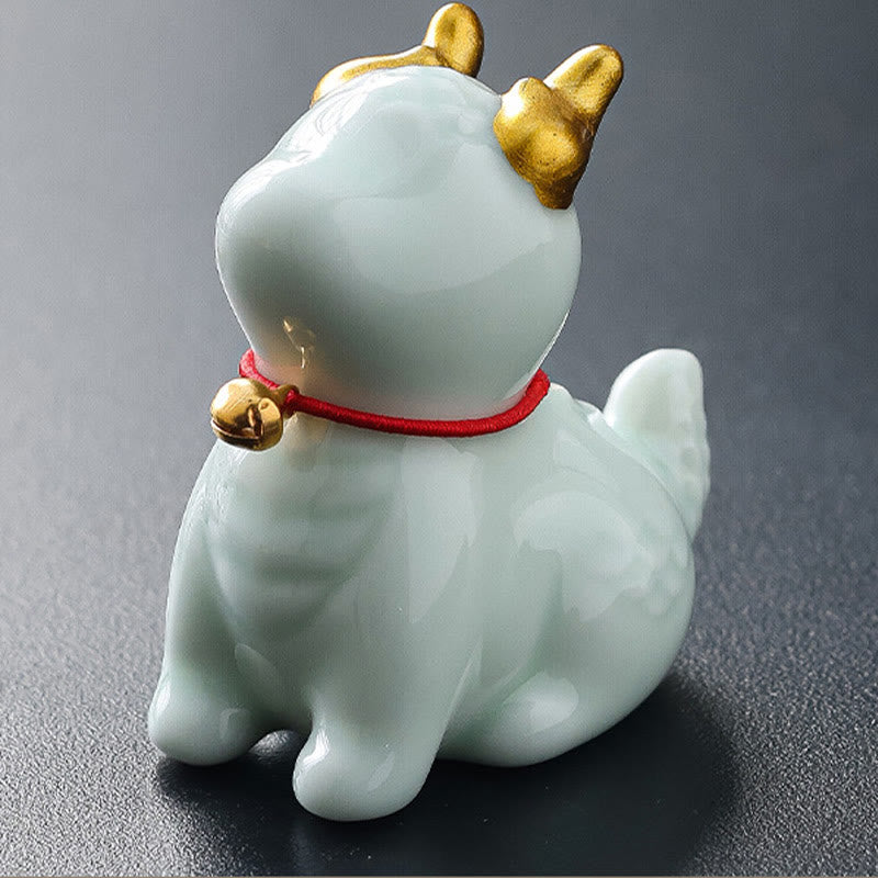 Ceramic Dragon Bell Incense Burner – yellow variant rear view on dark gradient surface, warm glow, Vitality