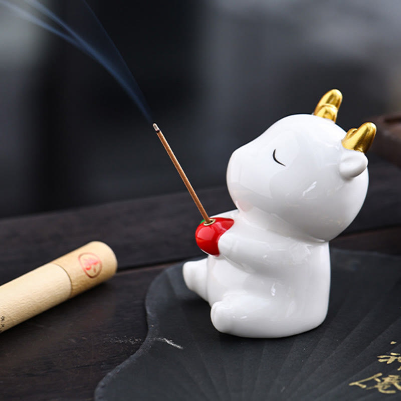 Deer Ceramic Incense Burner – White deer on dark stone slab, gold antlers, incense smoke rising, zen decor
