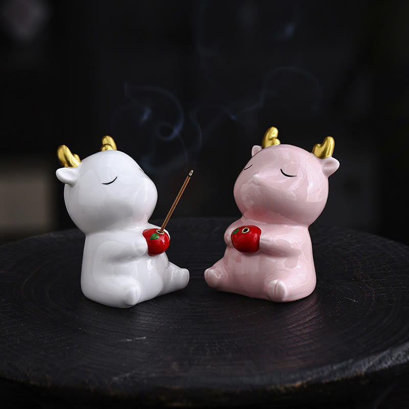 Deer Ceramic Incense Burner – Pale blue-white deer holding red apple incense holder, gold antlers, ceramic decor