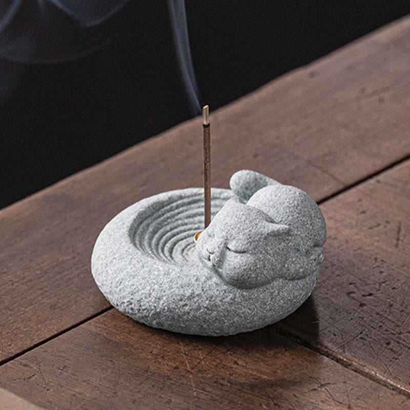 Lazy Cat Sandstone Incense Burner – cat on calligraphy paper, incense smoke curling up, traditional Chinese aesthetic