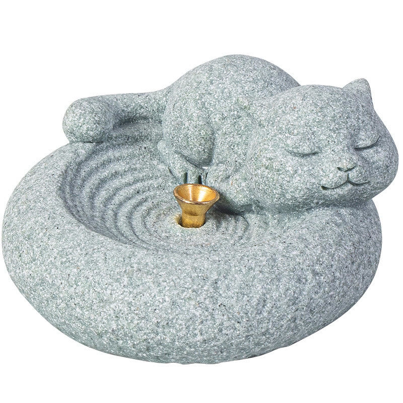 Lazy Cat Sandstone Incense Burner – sleeping cat on white background, three-quarter angle, gold incense cup, catalog studio
