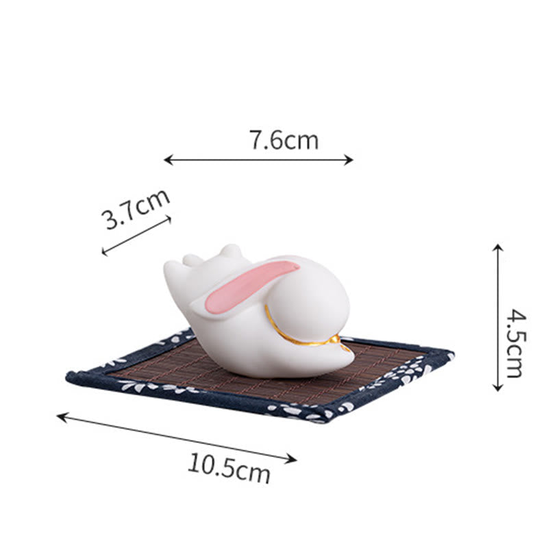 Flying Rabbit Ceramic Incense Burner – white rabbit on bamboo mat white background, ceramic incense burner