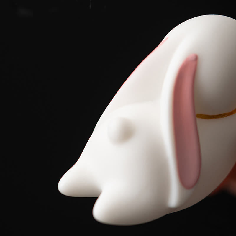 Flying Rabbit Ceramic Incense Burner – detail of white curved surface held in hand, ceramic incense burner
