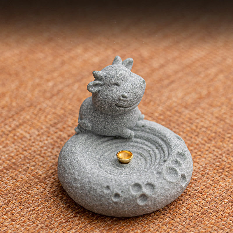 Chinese Zodiac Sandstone Incense Burner – content ox on brown woven mat, gold incense cup, zen garden base detail