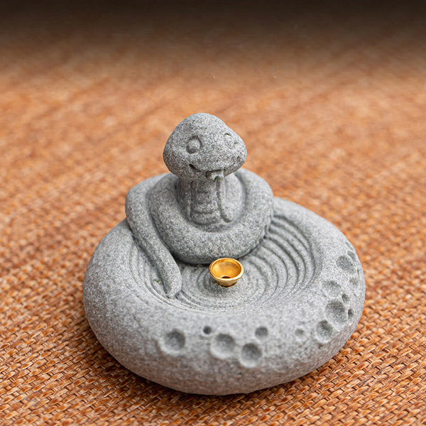 Chinese Zodiac Sandstone Incense Burner – coiled snake with robe on tan fabric, zen ripple base, brass incense cup