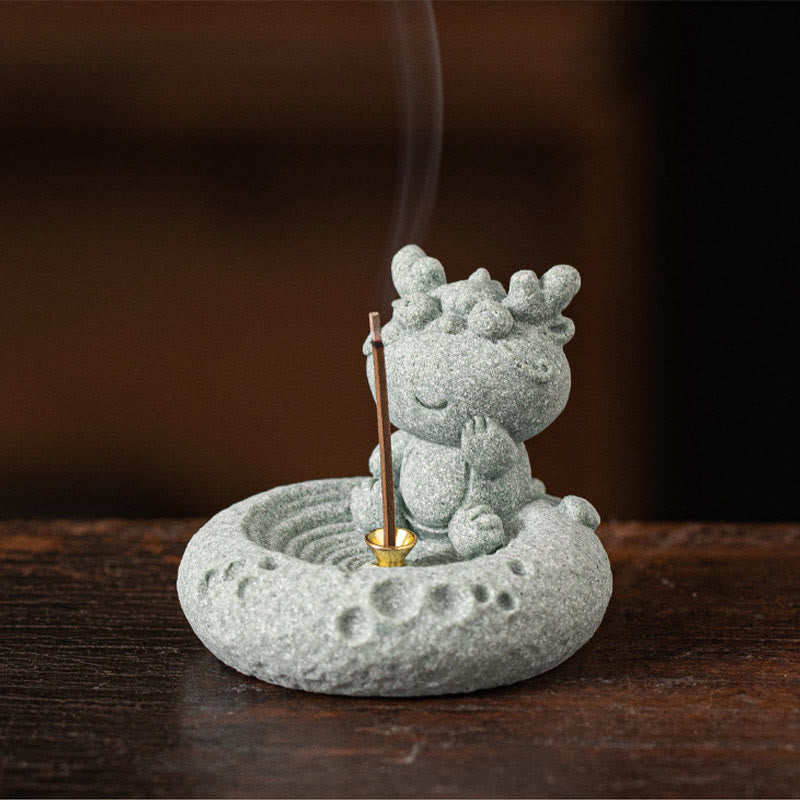Chinese Zodiac Sandstone Incense Burner – baby dragon with paw raised, warm brown blur, brass holder, mythical zodiac decor