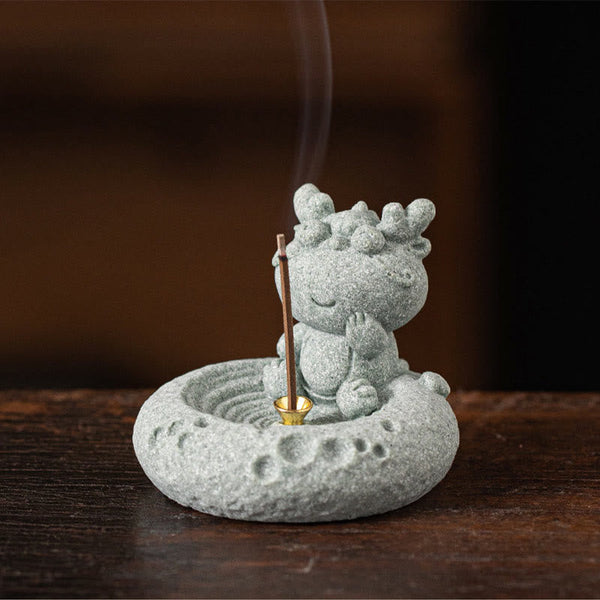 Chinese Zodiac Sandstone Incense Burner – baby dragon with paw raised, warm brown blur, brass holder, mythical zodiac decor