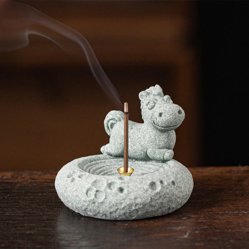 Chinese Zodiac Sandstone Incense Burner – horse on woven mat with smoke trail, shallow depth of field, cheerful expression