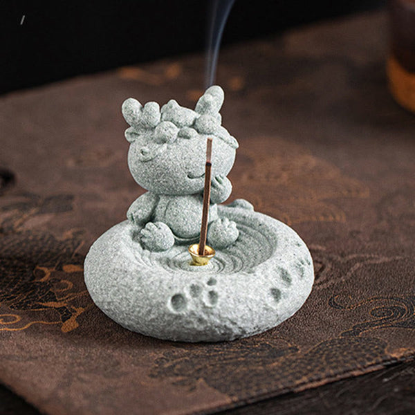 Chinese Zodiac Sandstone Incense Burner – dragon on moon crater base with smoke, dark brown texture, cute mythical creature