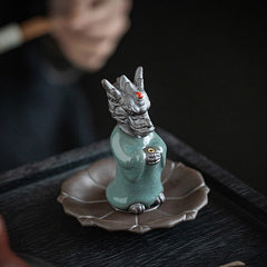 Ceramic Dragon King Incense Burner – silver dragon head with green crackle glaze robe, low angle, Reverence