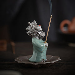 Ceramic Dragon King Incense Burner – figure with burning incense and smoke, profile view, Mindfulness