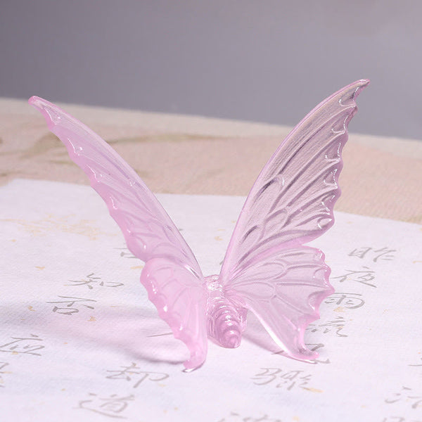Butterfly Liuli Glass Incense Burner - Soft pink translucent butterfly with detailed wing veins on calligraphy paper, liuli art