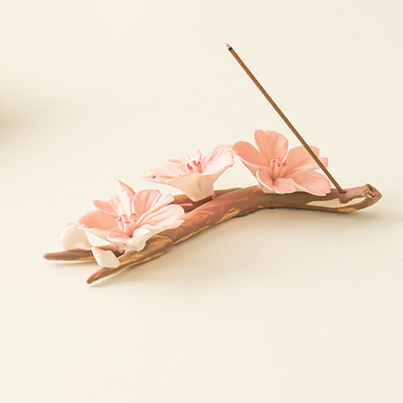 Plum Blossom Incense Burner – Curved brown branch with pink sakura flowers and angled incense stick