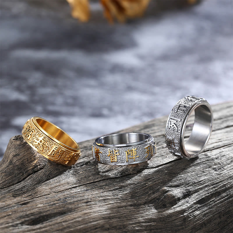 Tibetan Nine-Word Mantra Spinner Ring three color variants on driftwood, gold silver steel rings