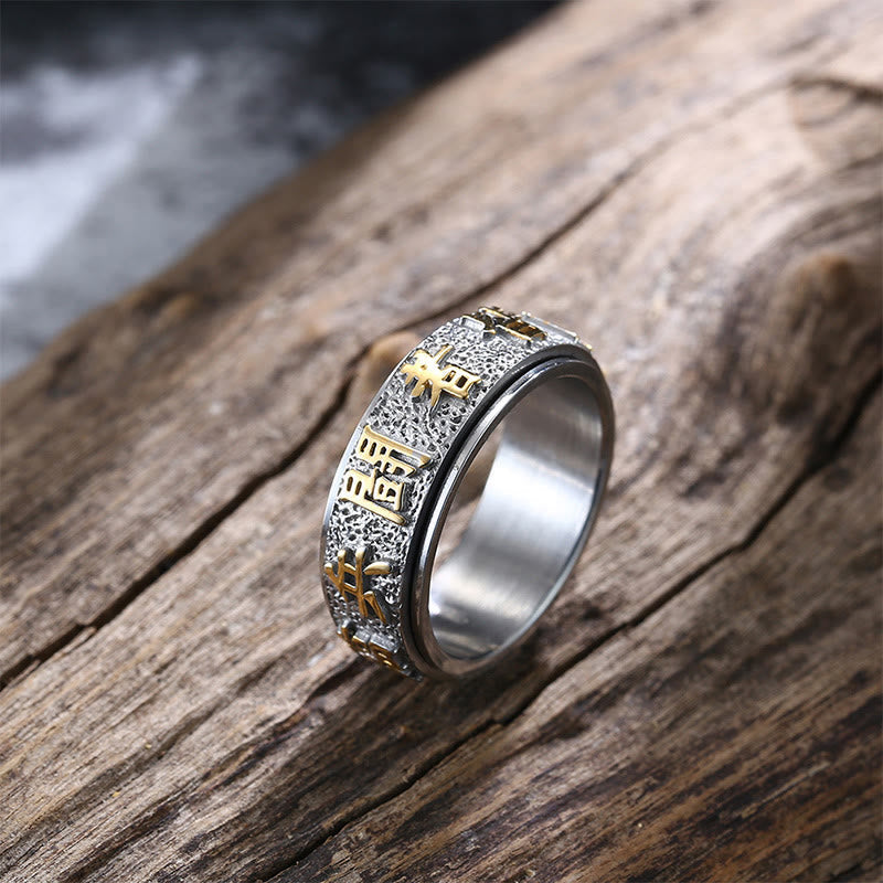 Tibetan Nine-Word Mantra Spinner Ring showing engraved gold kanji detail, men's statement ring