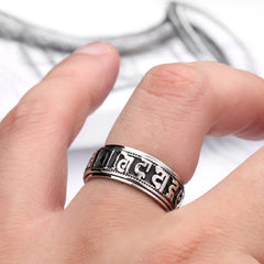 Tibetan Mantra Ring worn on finger, silver oxidized spinner ring
