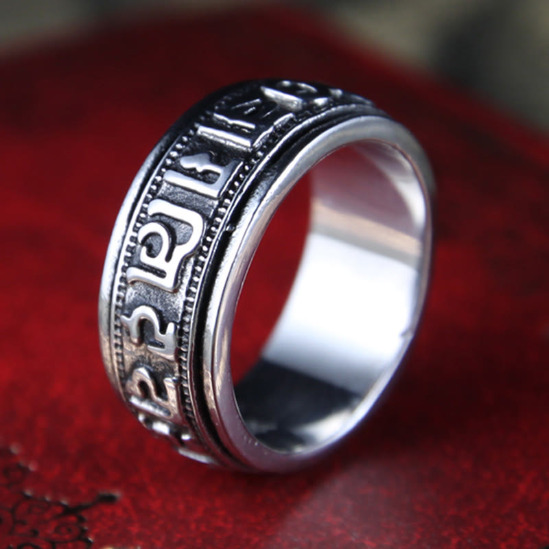 Silver Spinner Ring on burgundy velvet, Tibetan Buddhist prayer ring
