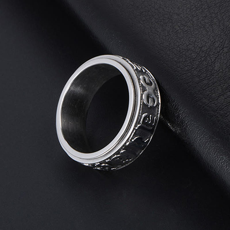 Silver Spinner Ring on dark leather, titanium steel band ring