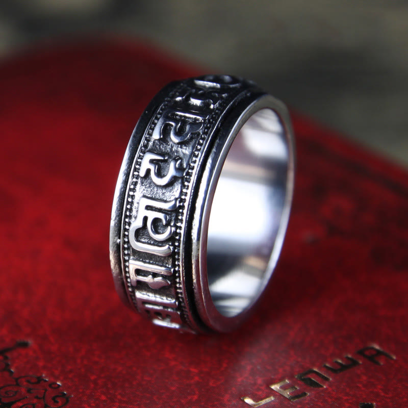 Tibetan Spinner Ring on red leather, silver mantra meditation ring Main image