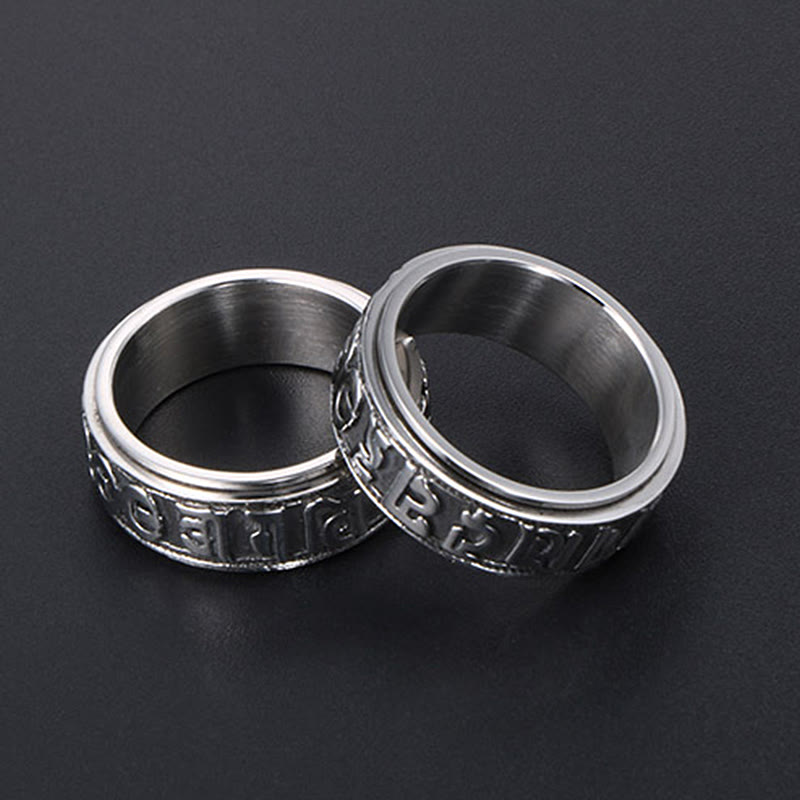 Two Tibetan Spinner Rings side by side, silver steel worry rings