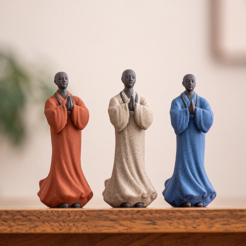 Ceramic Meditating Monk Figure – hands in dhyana mudra close-up, meditation gesture