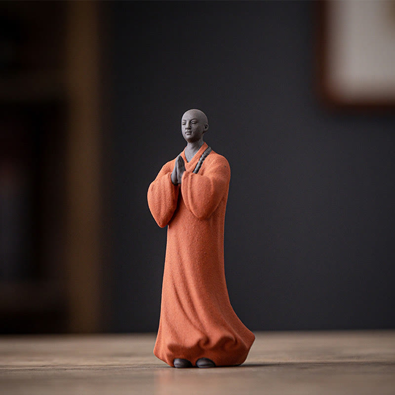 Ceramic Meditating Monk Figure – back view showing robe texture and ceramic glaze