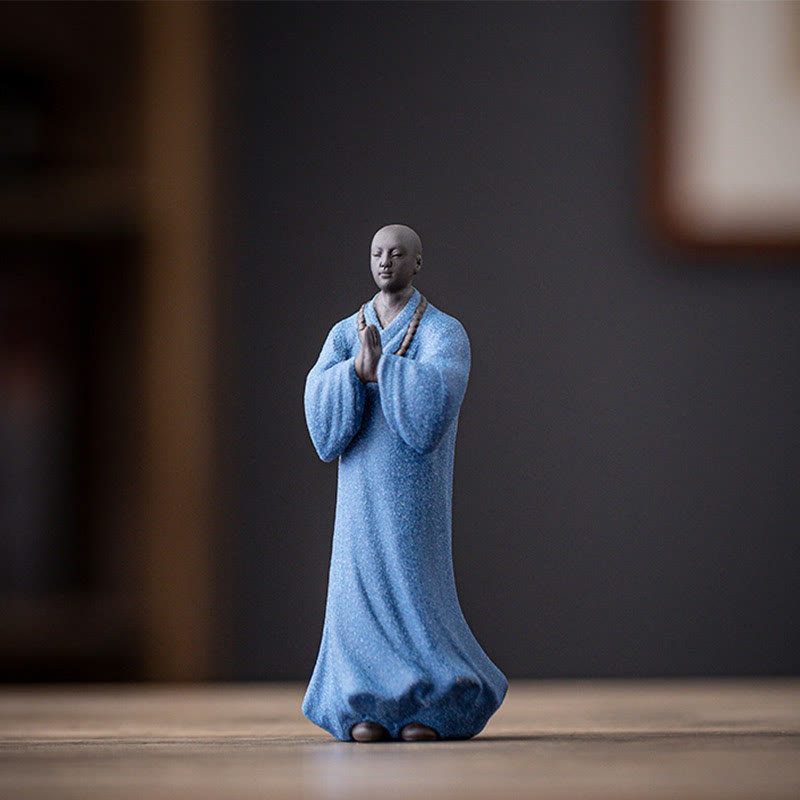 Ceramic Meditating Monk Figure – top-down view showing shaved head and robe drape