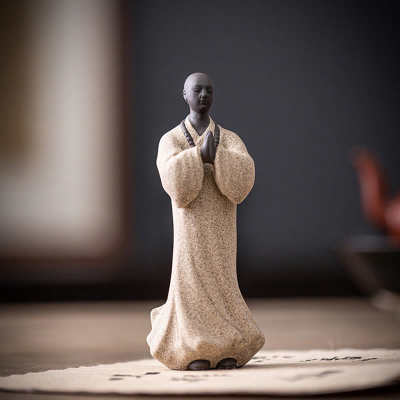 Ceramic Meditating Monk Figure – earthy brown and cream glaze, traditional pottery