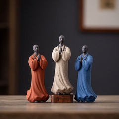 Ceramic Meditating Monk Figure – side profile showing robe folds and peaceful expression