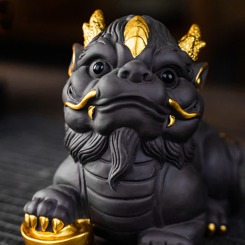 PiXiu Ingot Ball Purple Clay Tea Pet – Front close-up of gold-accented PiXiu face showing horns and beard details