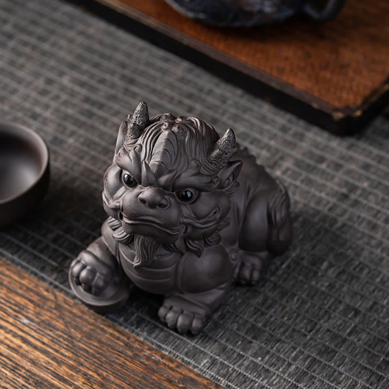 PiXiu Ingot Ball Purple Clay Tea Pet – Top-down view of black PiXiu on tea mat showing head and rounded body shape