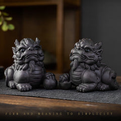 PiXiu Ingot Ball Purple Clay Tea Pet – Two black clay PiXiu tea pets side by side on wooden surface, zen home decor