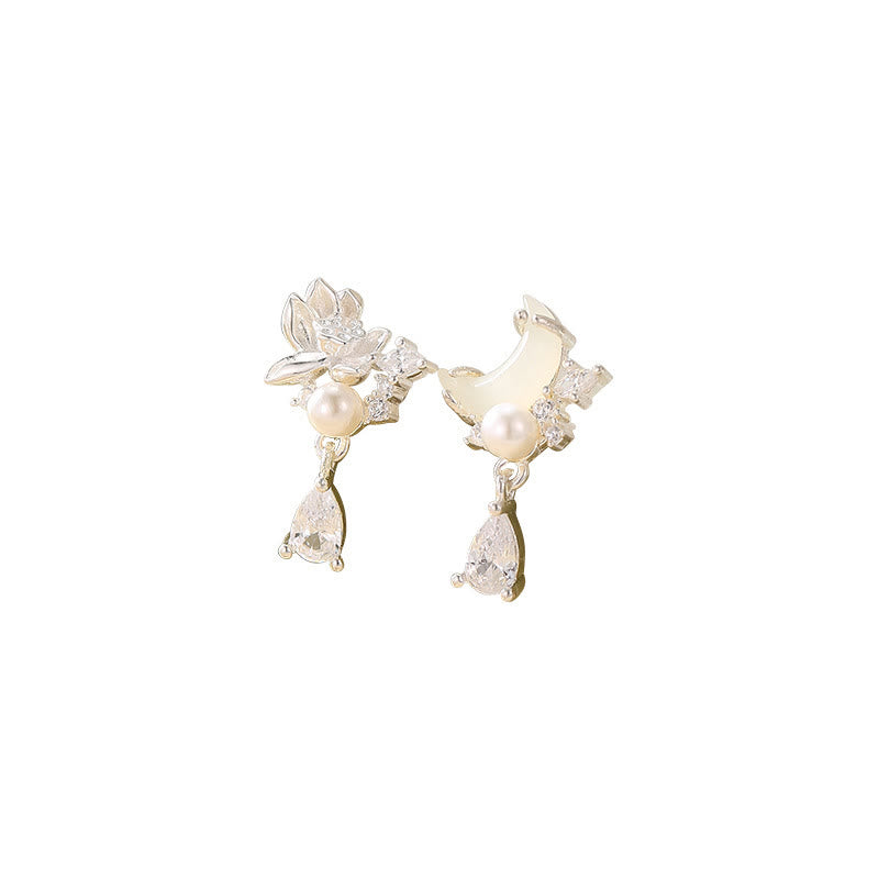 Hetian Jade & Sterling Silver Lotus Moon Earrings - asymmetrical lotus and moon pair on white background, sterling silver