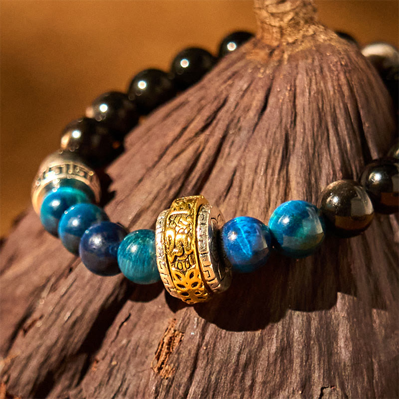 Om Mani Padme Hum Bracelet - Beaded bracelet on dried lotus pod with gold charm detail, yoga jewelry