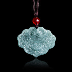 Lotus Pattern Carved Jade Pendant Necklace - green jade lotus carving front view, dark braided cord, reflective surface