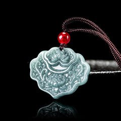 Lotus Pattern Carved Jade Pendant Necklace - ruyi-shaped celadon jade with lotus relief on black, red bead accent