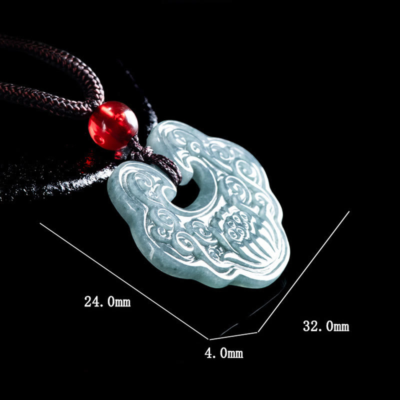 Lotus Jade Ruyi Pendant – carved green jade amulet with dimensional details, prosperity