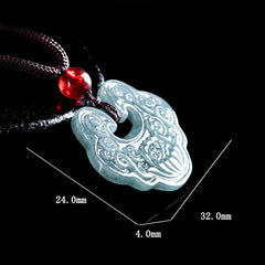 Lotus Jade Ruyi Pendant – carved green jade amulet with dimensional details, prosperity